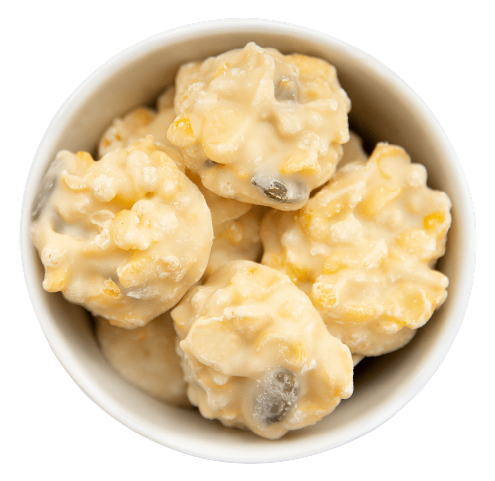 Schoko-Crispies mit weißer Schokolade, Kürbiskernen und Erdbeere in der Faltschachtel
